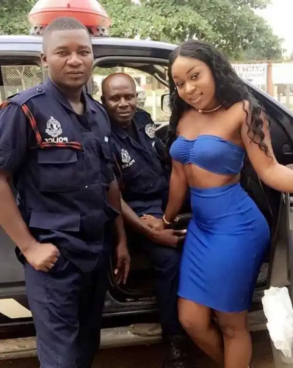 Ghanaian Actress, Efia Odo, Slammed For Posing Braless With Policemen (Photo)